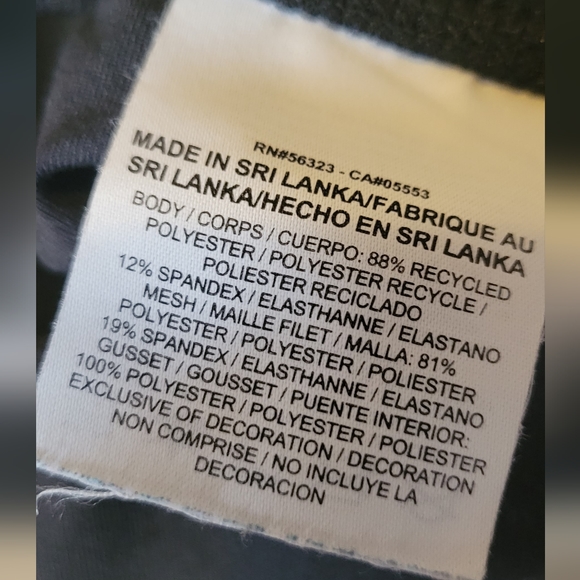 Nike dri-fit womens medium capris black with neon green & blue sheer on back of - Picture 9 of 12